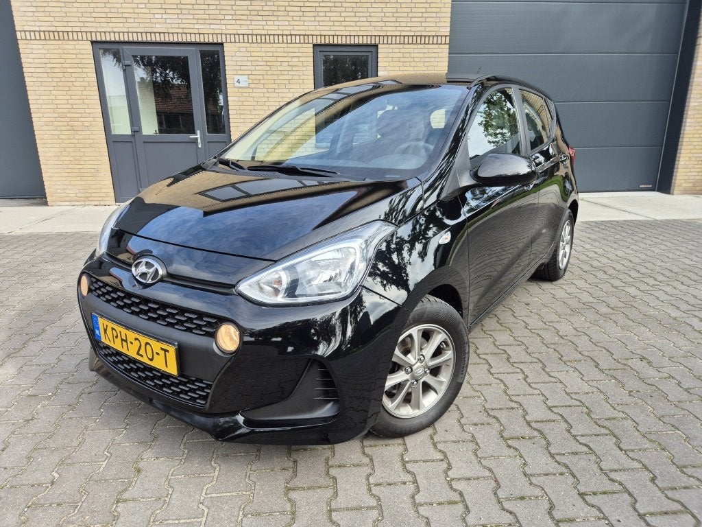 Hyundai i10 1.0i Comfort | LM velgen | Airco | Navi | Cruise, Auto's, Stof, Gebruikt, Start-stop-systeem, Zwart