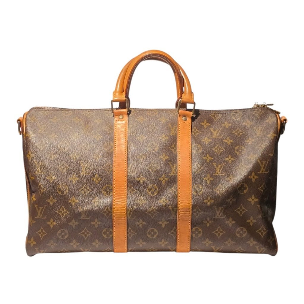 Louis Vuitton Keepall 45 Bandoulière Mono Brown 1993, Louis Vuitton, Gebruikt, Support@louisvuitton.com, 2 Rue du Pont Neuf
75001 Paris
France
