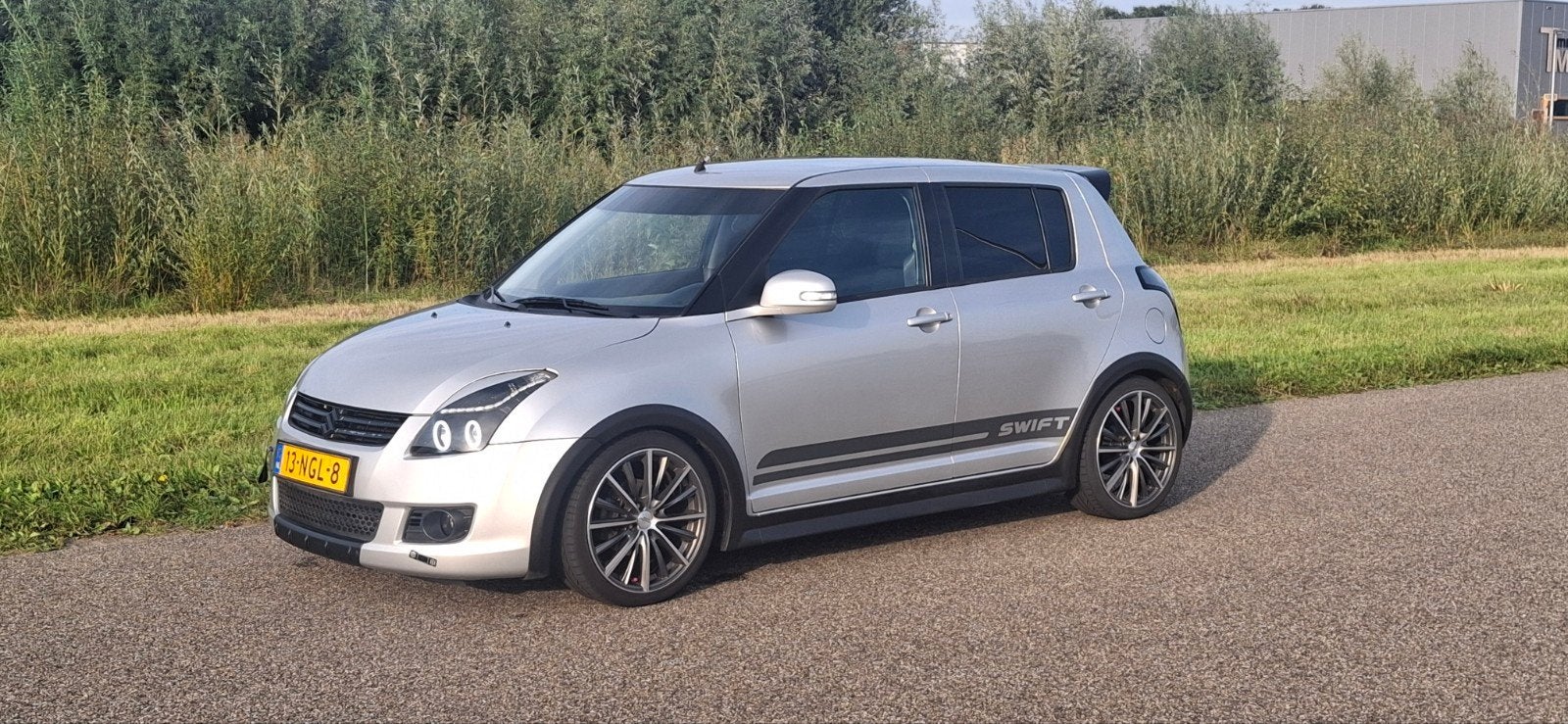 Suzuki Swift 1.3 5D 2010 zilver/grijs met nieuwe apk., Auto's, Voorwielaandrijving, 40 €/maand, 400 kg, Swift