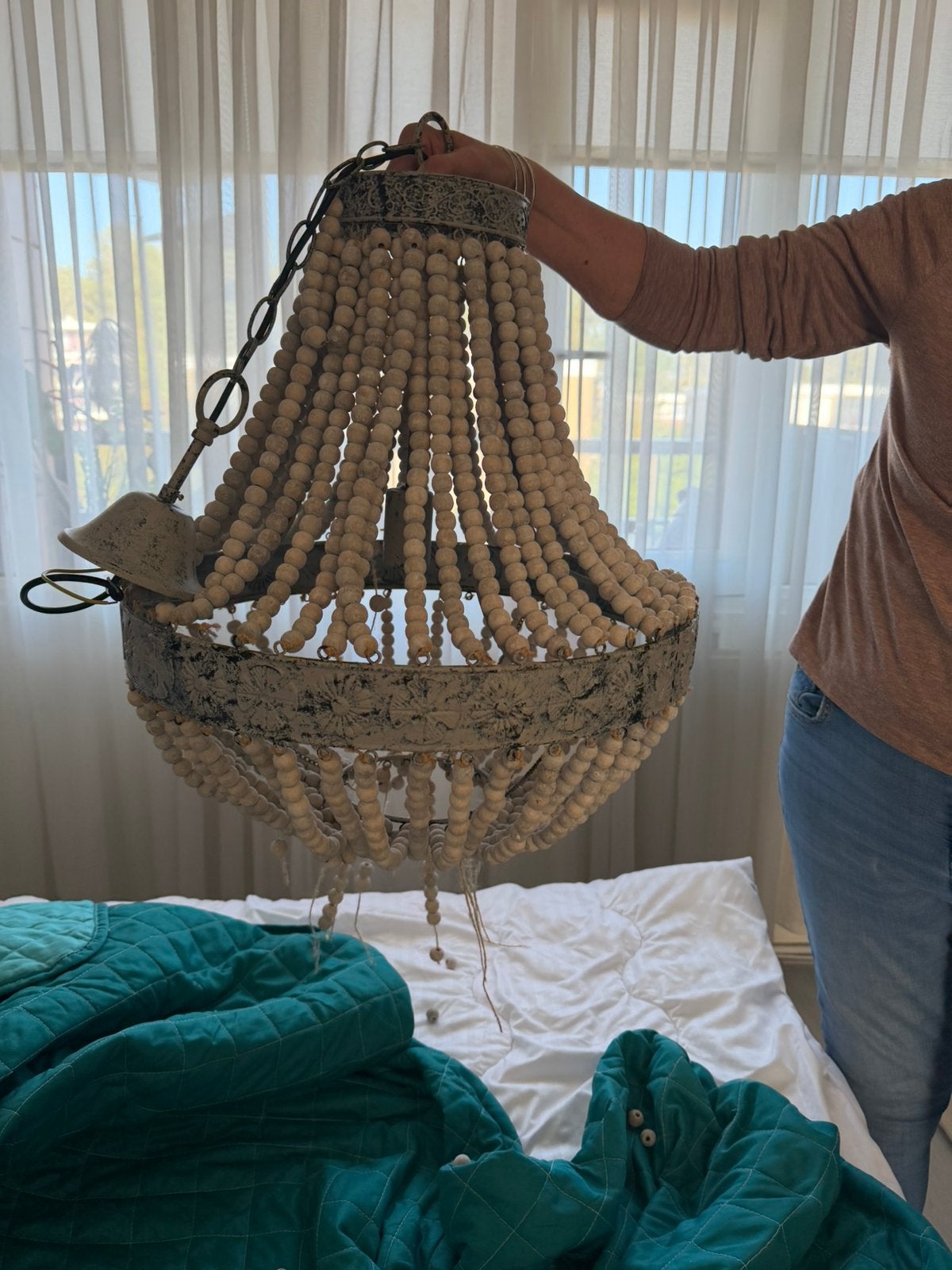 Kralen hanglamp, Ophalen