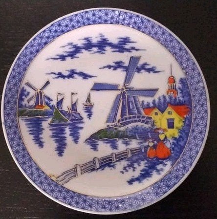 Decoratief bord met Nederlands landschap en molens, Ophalen