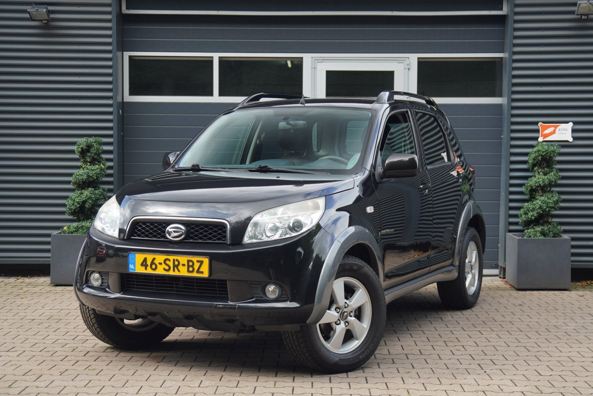 Daihatsu Terios 1.5-16v Exclusive LEDER 4WD ORIG NL NAP, Auto's, 1350 kg, Gebruikt, Zwart, 1165 kg
