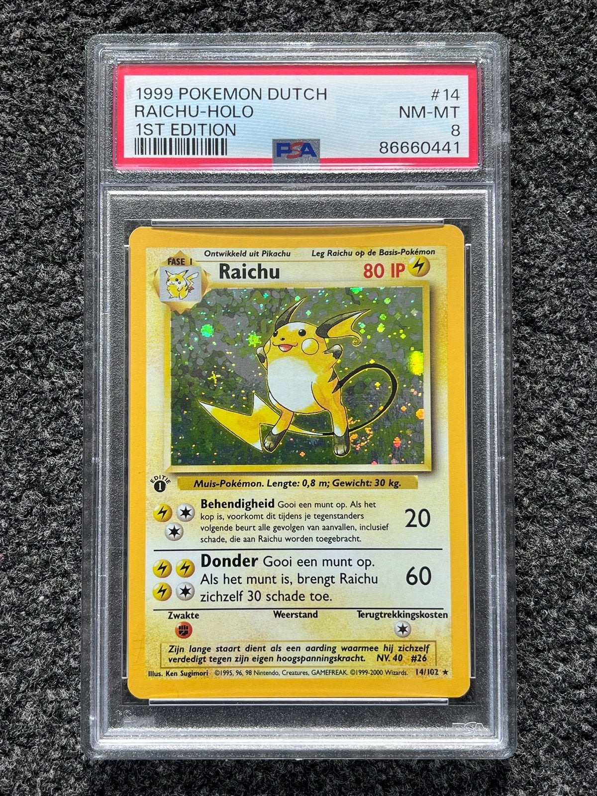 Pokémon PSA 8 1st edition Dutch Raichu Holo #14 Base set, Ophalen of Verzenden, Zo goed als nieuw, Losse kaart, Foil