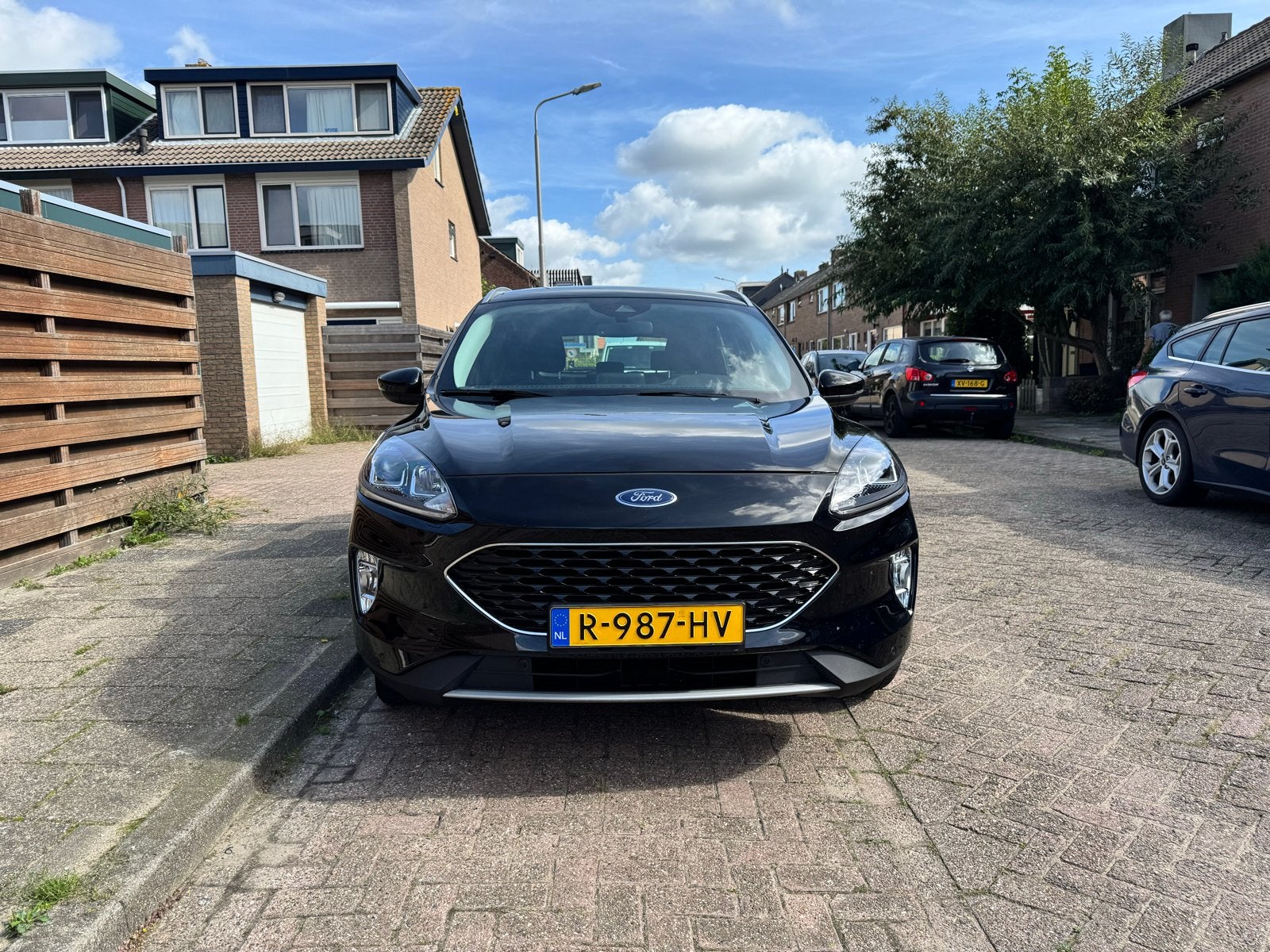 Ford Kuga 66000 km NAP,dealer onderhouden. Gratis onderhoud!, Zwart, Dealer onderhouden, Kuga, SUV of Terreinwagen