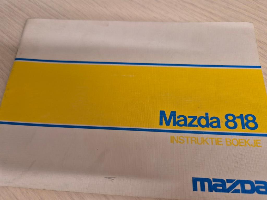Jaren 70 Nederlands Mazda 818 instructieboekje handleiding, Ophalen of Verzenden