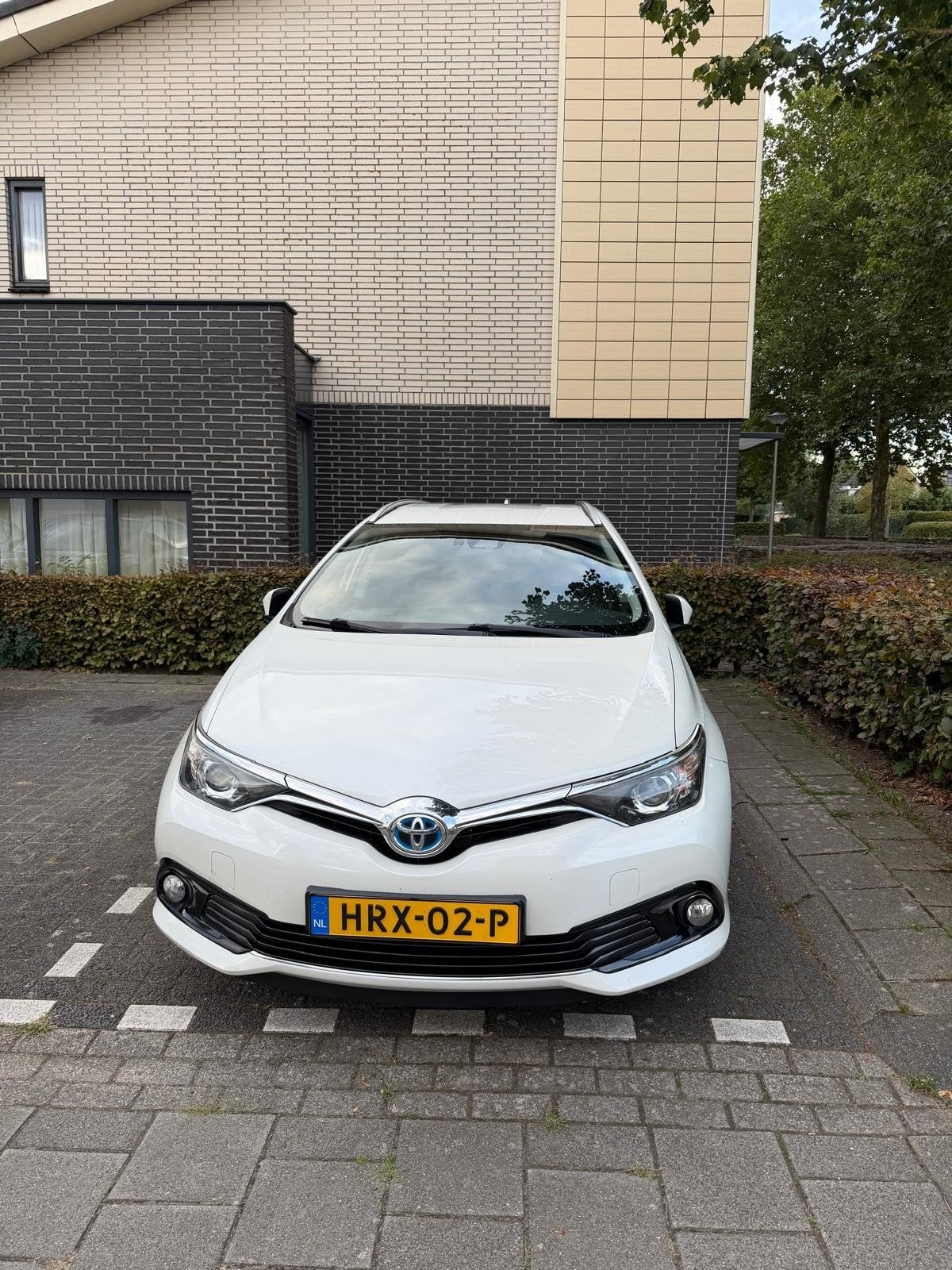 Toyota Auris 1.8 Hybrid 136pk Aut 2018 Wit, Auto's, Wit, 25 km/l, Te koop, Volledig hybride