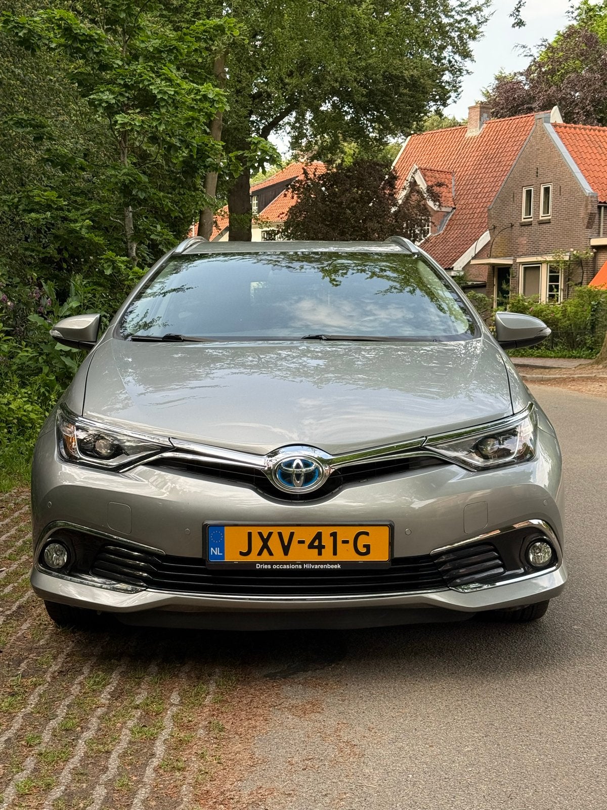 Toyota Auris 1.8 Hybrid Touring 2017 | DEALERONDERHOUDEN, Auto's, Toyota, 345 kg, Leder en Stof, 25 km/l, Volledig hybride