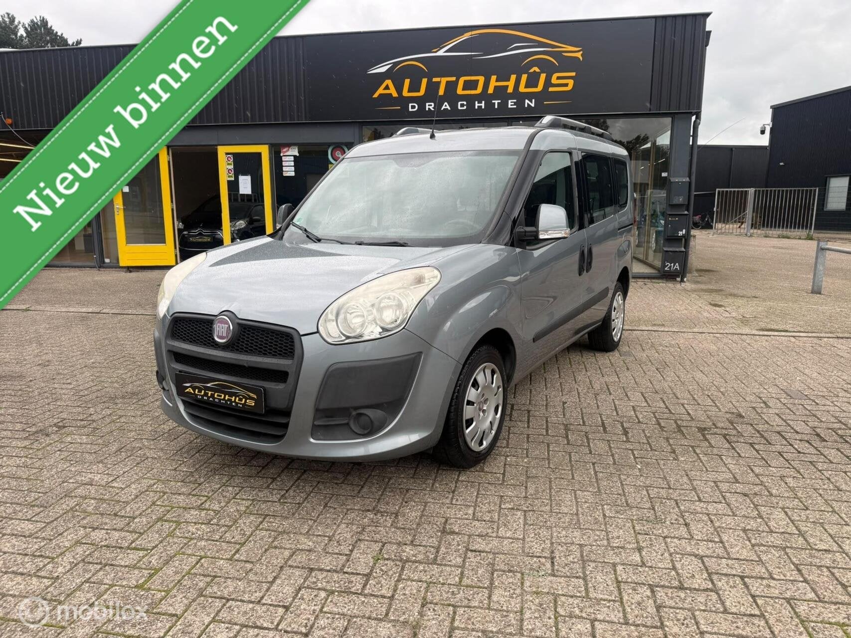 Fiat Doblo 1.4 Emotion 7p. AIRCO EL RAMEN TREKHAAK 120817 KM, Auto's, Voorwielaandrijving, Stof, Gebruikt, Blauw