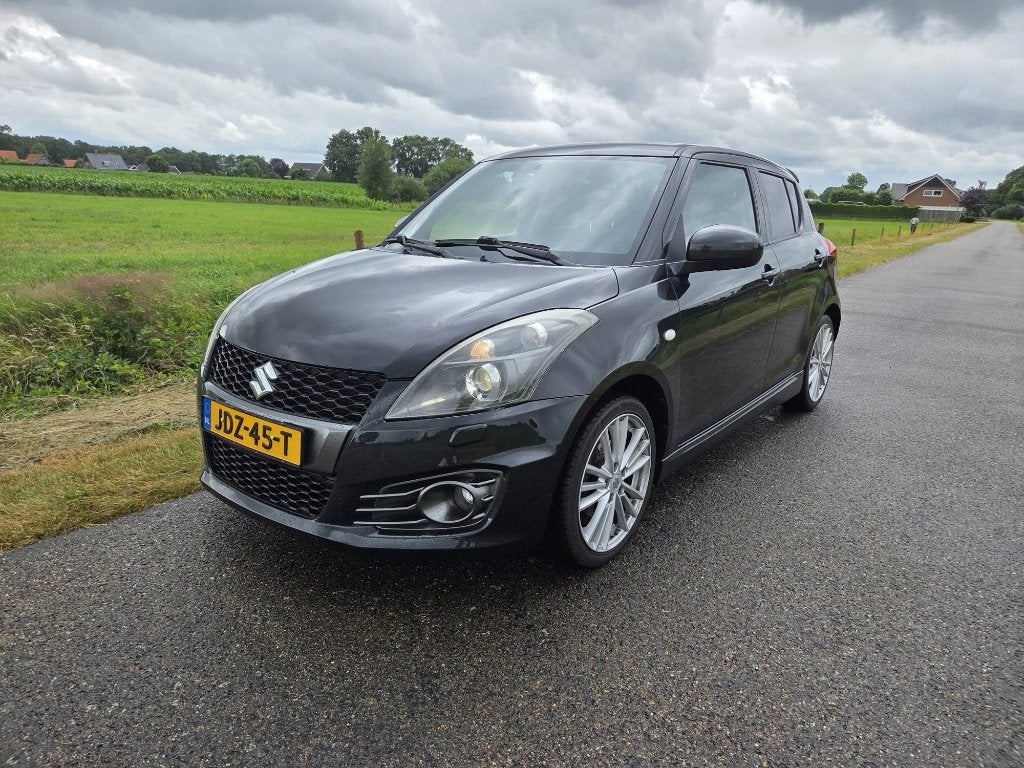 Suzuki Swift 1.6 5D Sport 2016 Zwart, Auto's, Voorwielaandrijving, 136 pk, Zwart, 4 cilinders