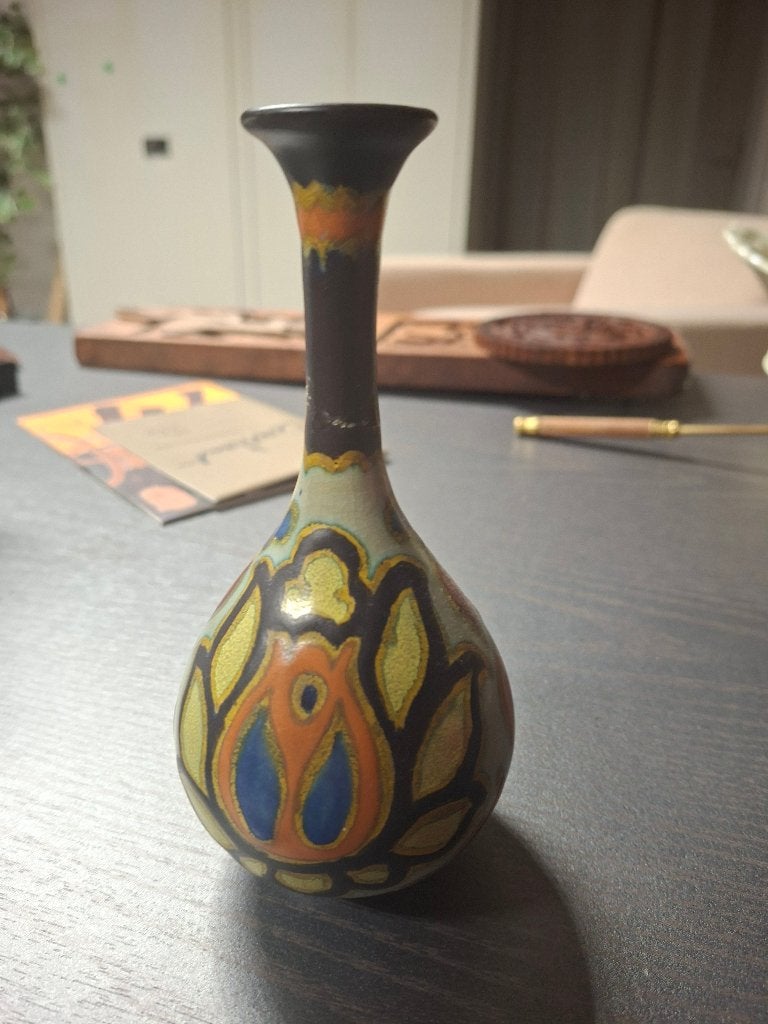 Gouds plateels vaasje, Ophalen