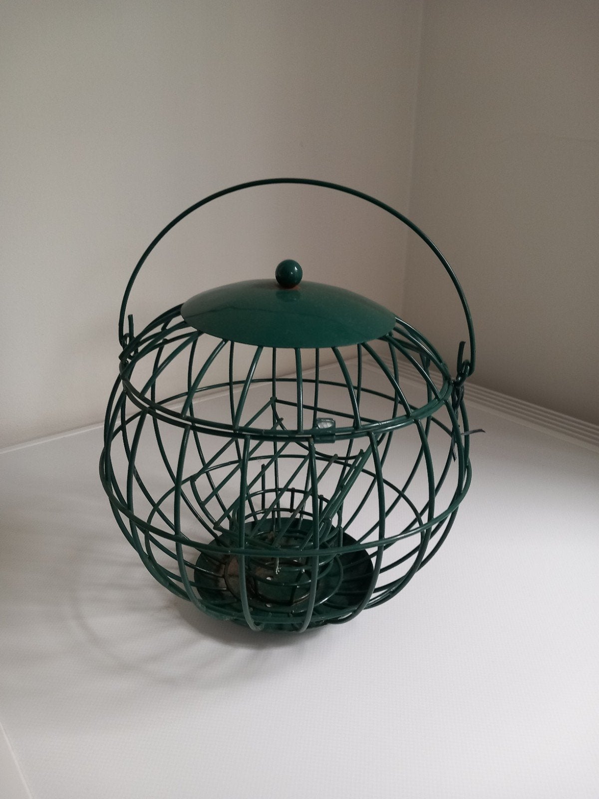 voederkooi vogels, Ophalen