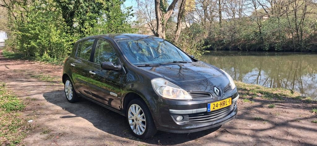 Renault Clio 1.2 16V 55KW 5-DRS E4 rib curl  lmv Cruise airc, Auto's, Voorwielaandrijving, 74 pk, Zwart, 4 cilinders