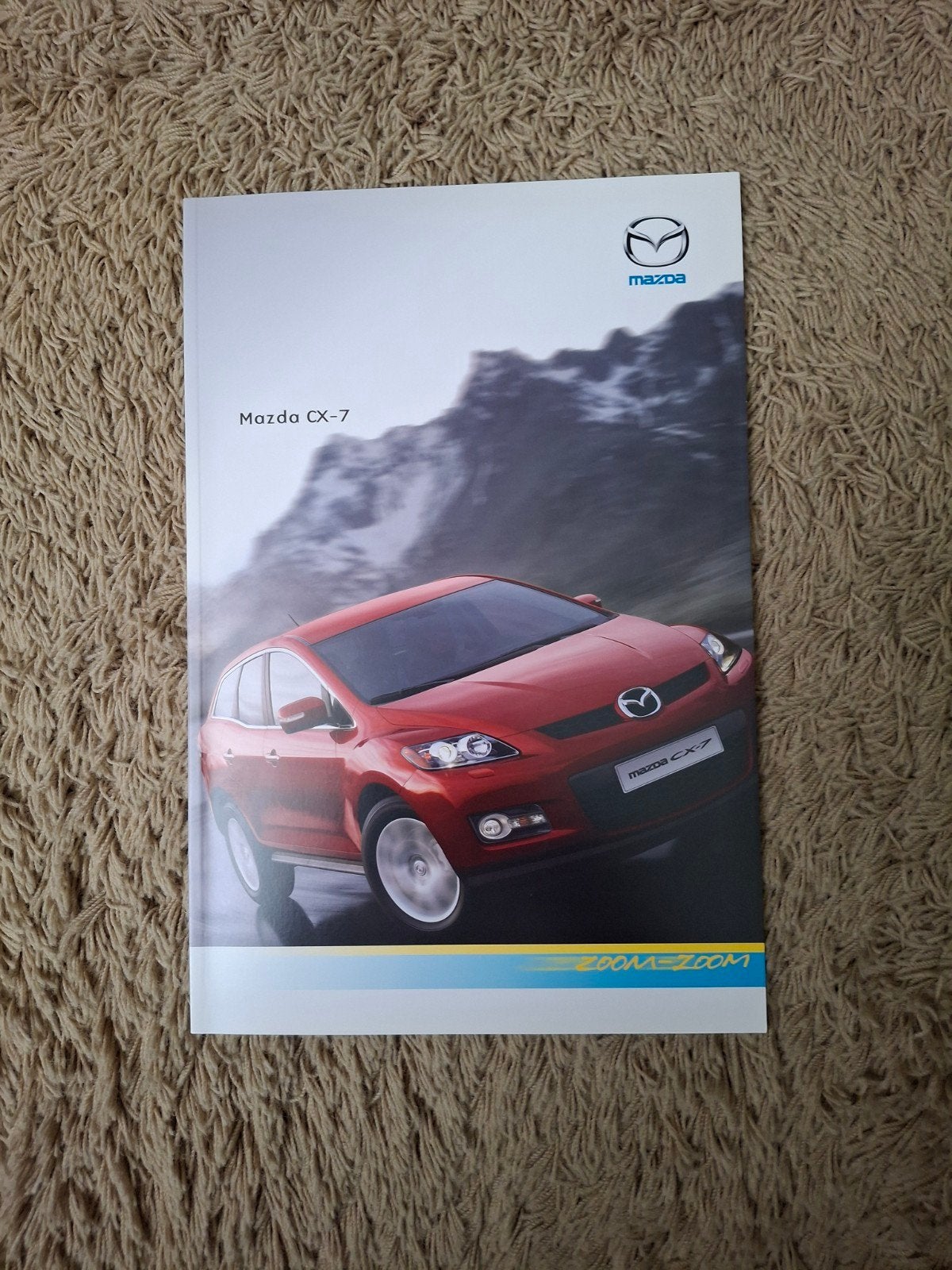 Autofolder Mazda CX-7, Verzenden, Zo goed als nieuw, Mazda
