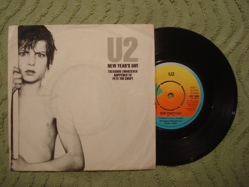 U2 7" Vinyl Single: ‘New Year’s Day’ (UK) palm tree label, Ophalen of Verzenden, Zo goed als nieuw, Rock en Metal