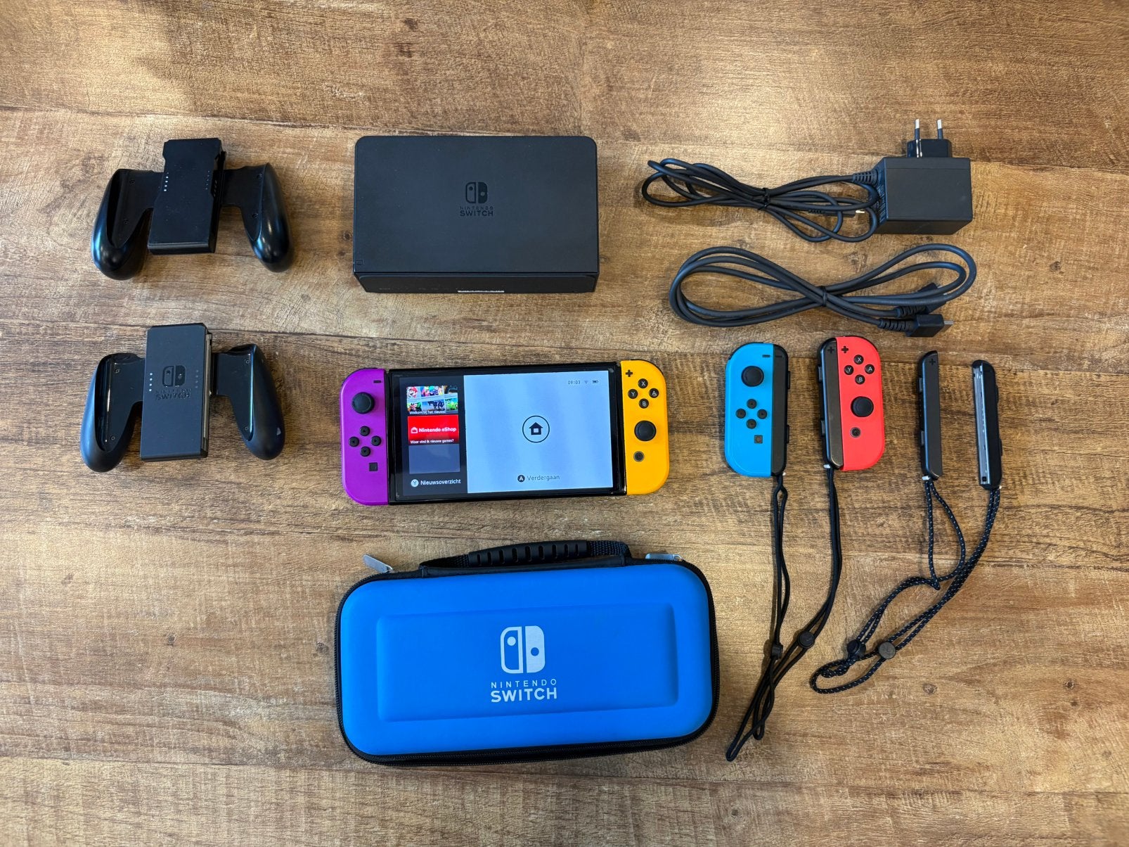 Nintendo Switch OLED + 4 controllers + garantie
