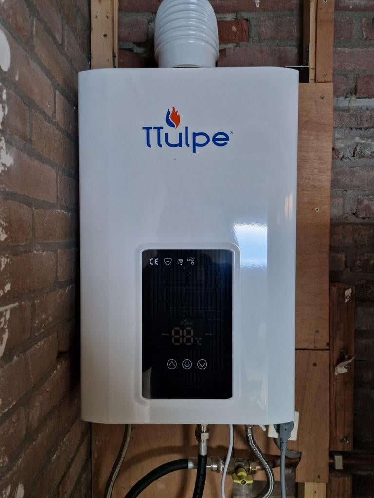TTulpe Geiser - Nieuwstaat, direct warm water, Doe-het-zelf en Verbouw, Geisers en Boilers, Geiser, Ophalen of Verzenden, Minder dan 20 liter