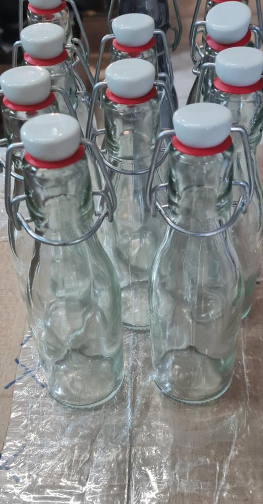 Leeg flessen van glas met beugel in nieuw staat nooit gebrui, Ophalen of Verzenden, Zo goed als nieuw, Glas, Pot, Bus of Blik