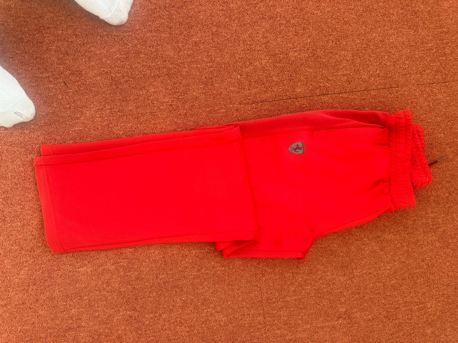 Rood trainingspak Ferrari, Ophalen of Verzenden, Zo goed als nieuw, Maat 48/50 (M)