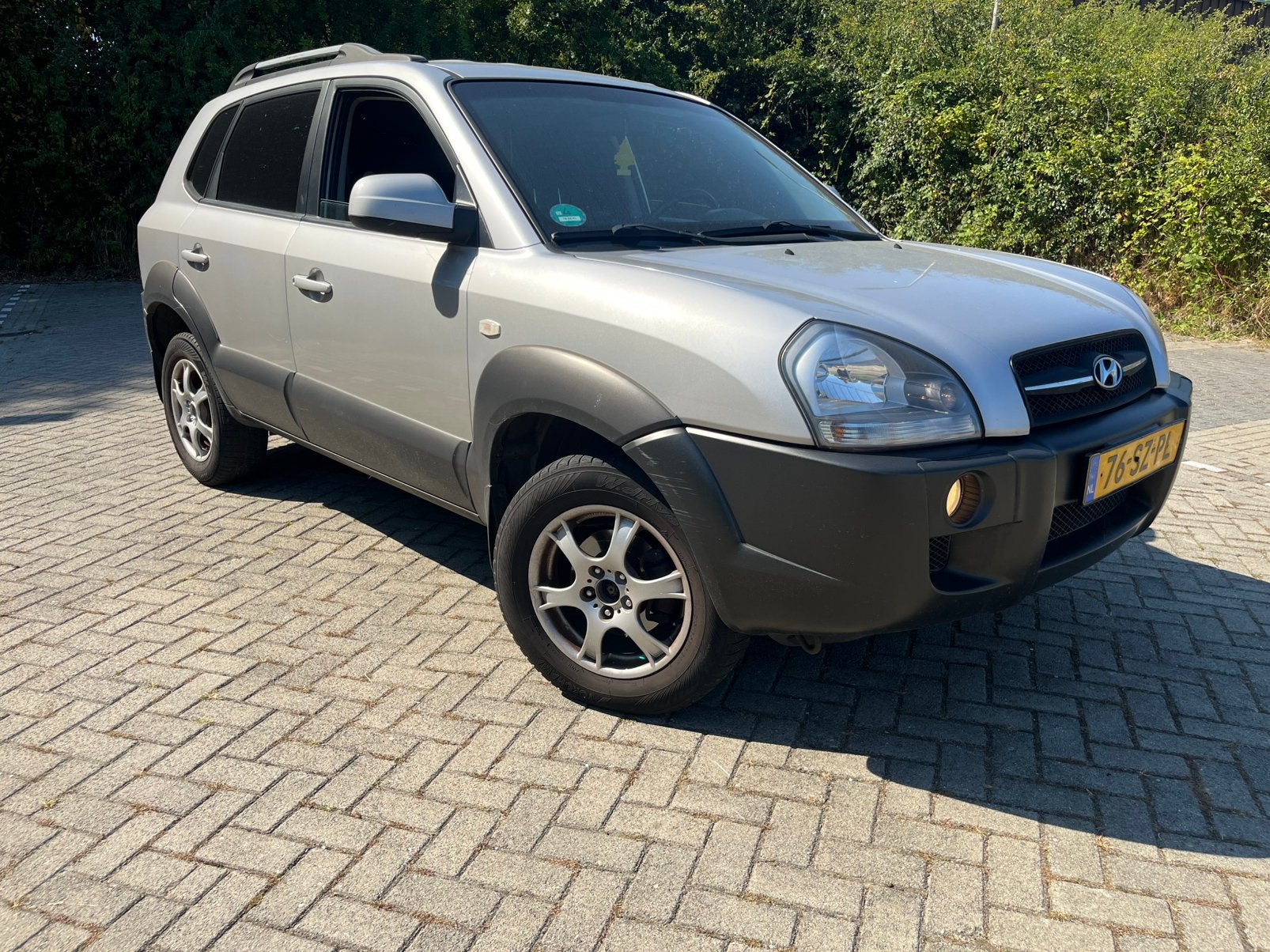 Hyundai Tucson 2.0 I 2WD 2006 Grijs, Auto's, Hyundai, Stof, 4 cilinders, Origineel Nederlands, Handgeschakeld