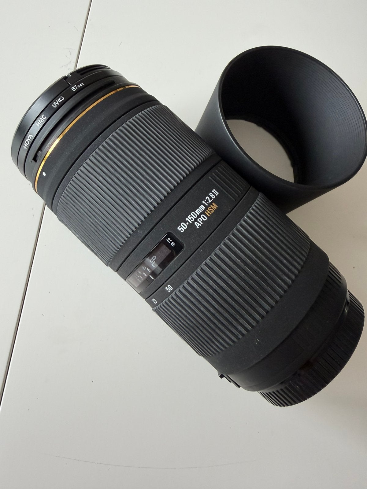 Sigma 50-150mm f/2.8 II APO EX DC HSM-Canon + Hoya UV-filter, Audio, Tv en Foto, Fotografie | Lenzen en Objectieven, Ophalen, Gebruikt