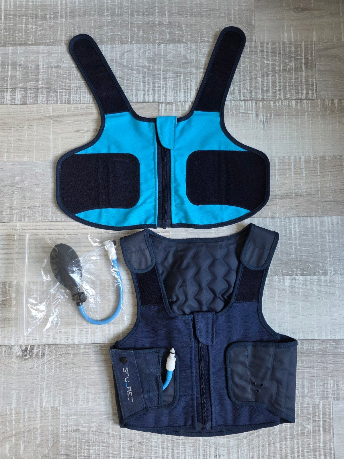 Squease vest XXS met pompje en extra voorkantjes, Ophalen of Verzenden, Jongen of Meisje