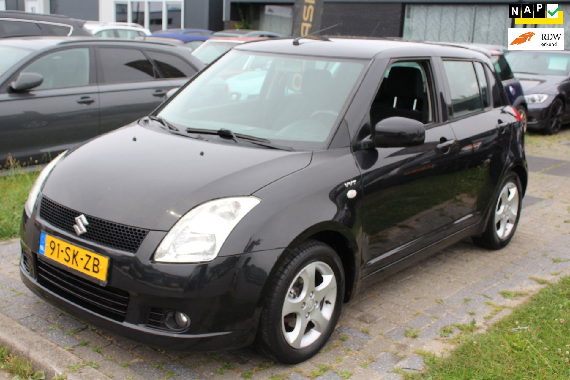 Suzuki Swift 1.5 Exclusive Sport 5-deurs Airco LM-Velgen Zwa, Voorwielaandrijving, Zwart, 4 cilinders, Automatische klimaatregeling