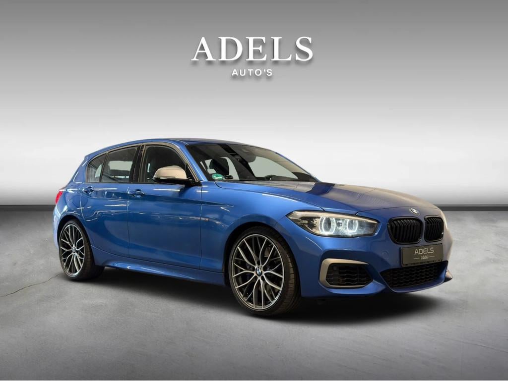 BMW 1 Serie M140i Special Edition Estoril Blauw Dealer Onder, Achterwielaandrijving, Gebruikt, Zwart, Blauw