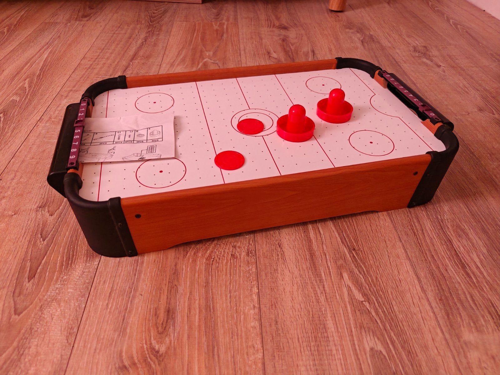 Te koop: airhockey minispel, Ophalen