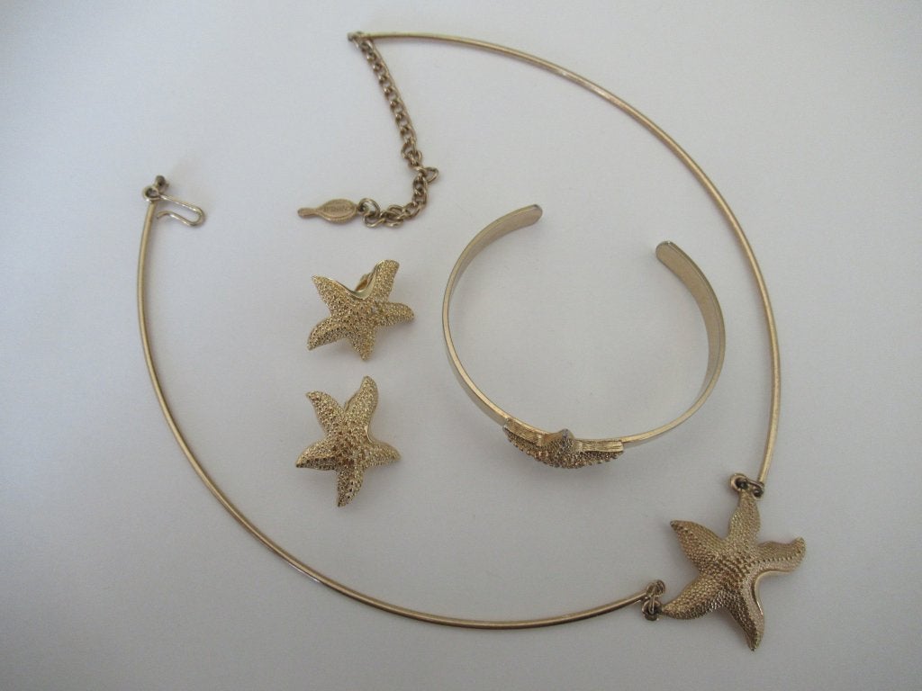 Ketting armband oorbellen /zeester Sarah Coventry, Verzenden, Zo goed als nieuw, Goud, Overige materialen