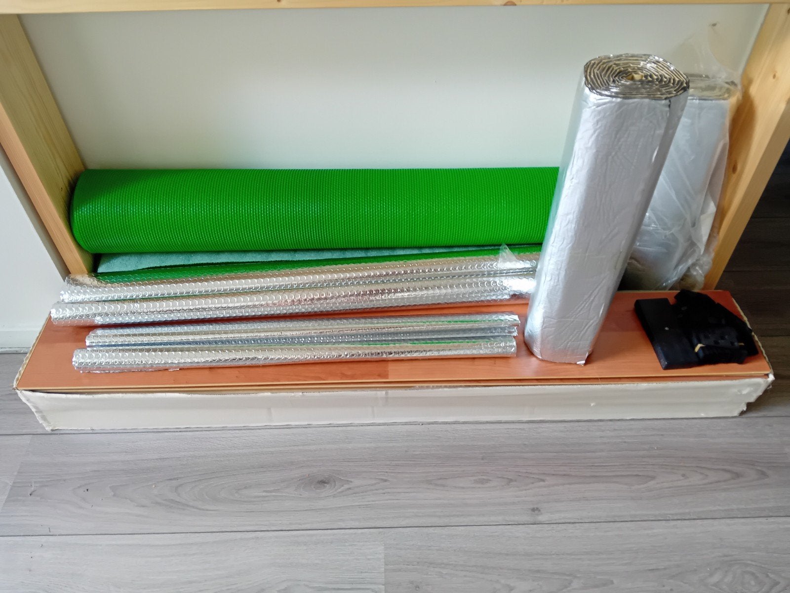 Ondervloer, laminaat en installatiebenodigdheden, Ophalen