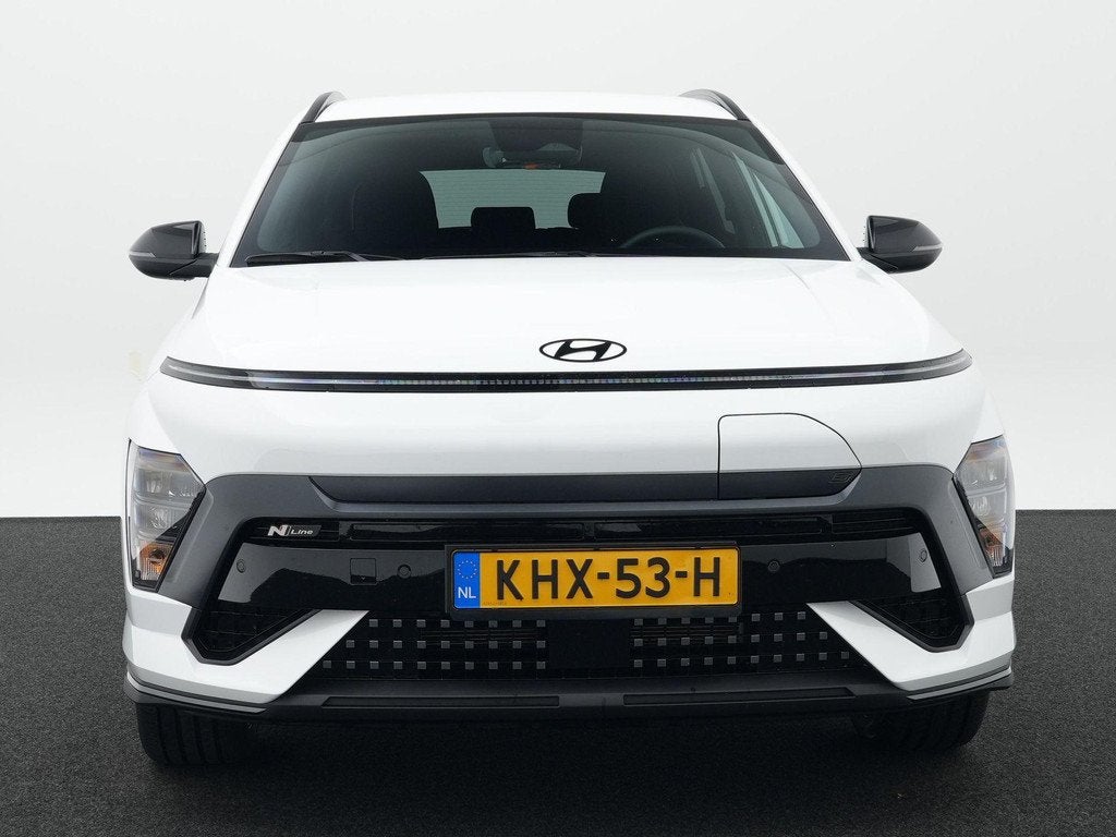 Hyundai Kona Electric N Line Business 64.8 kWh | Bose Audio, Auto's, Hyundai, 12 maanden, Stof, 750 kg, Wit