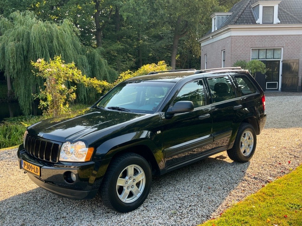 Jeep GRAND CHEROKEE 4.7 V8 LAREDO 4x4 Automaat 3500kg TREKHA, Auto's, Automaat, 232 pk, Gebruikt, 8 cilinders