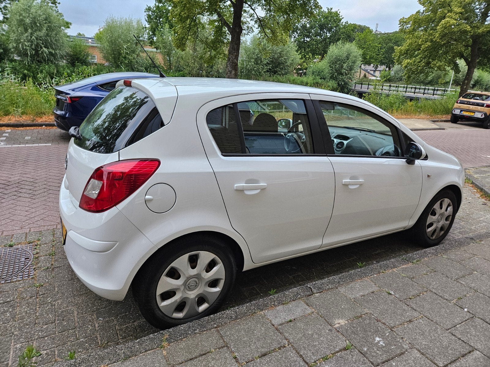 Opel Corsa 1.0 12V 5D 2011 Wit, Euro 5, Stof, 40 €/maand, 1045 kg