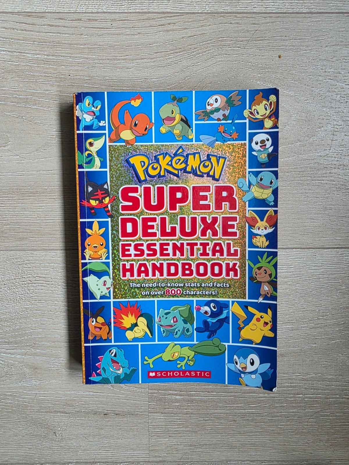 Pokémon Super Deluxe Essential Handbook (Engels), Ophalen of Verzenden, Gelezen