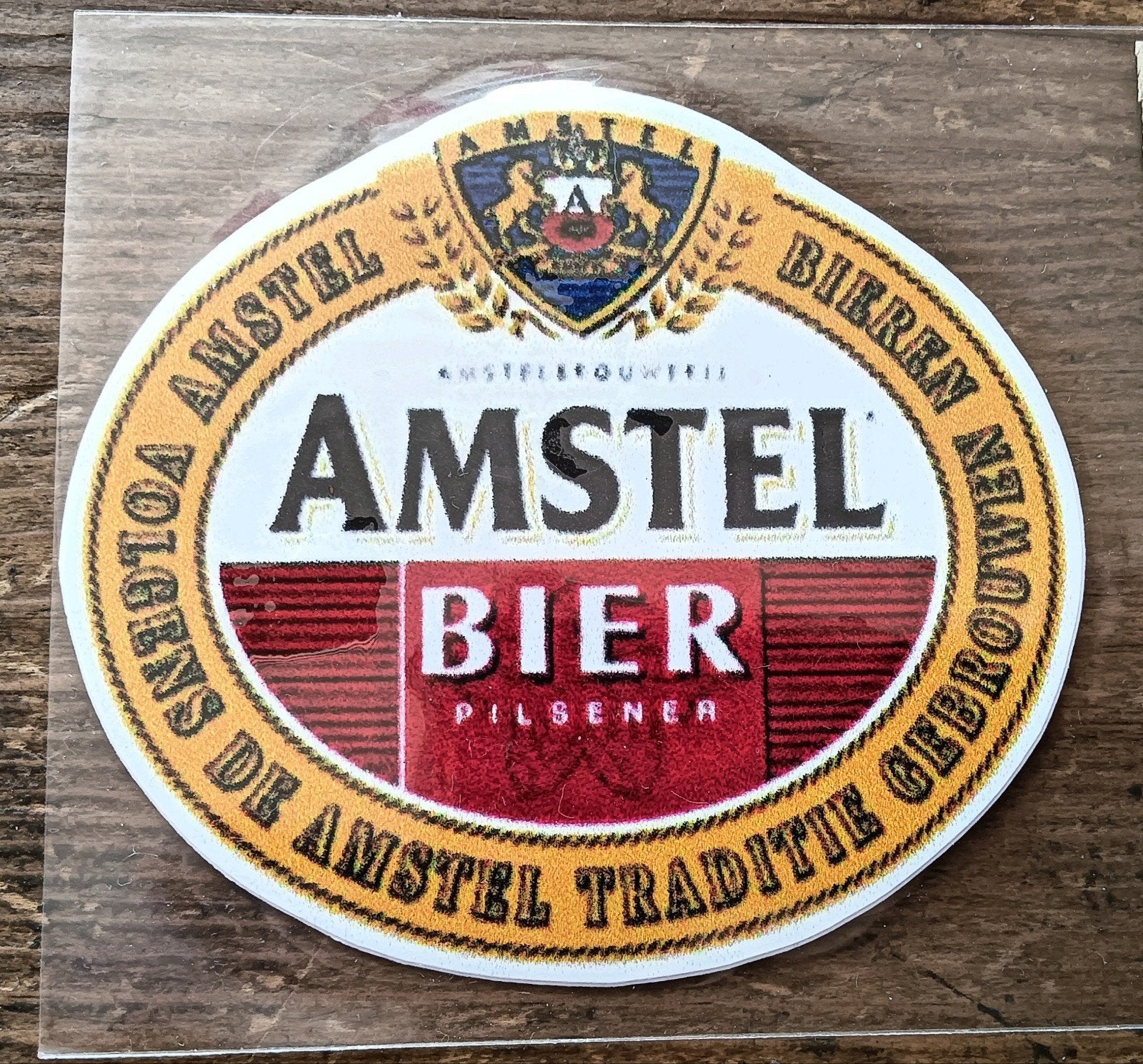 Amstel Bier Sticker - 7,7 cm breed, 6,9 cm hoog, Ophalen, Nieuw, Amstel