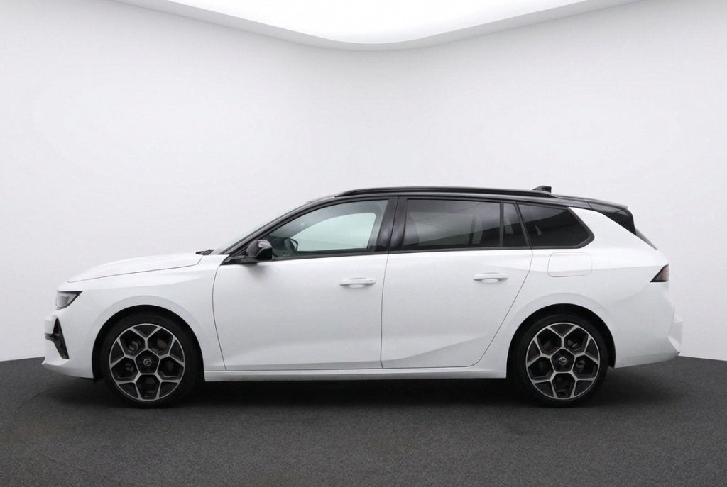 Opel Astra Sports Tourer 1.6 Turbo GS PHEV Panoramadak | Mat, Auto's, Gebruikt, 4 cilinders, Wit, Hybride Elektrisch/Benzine