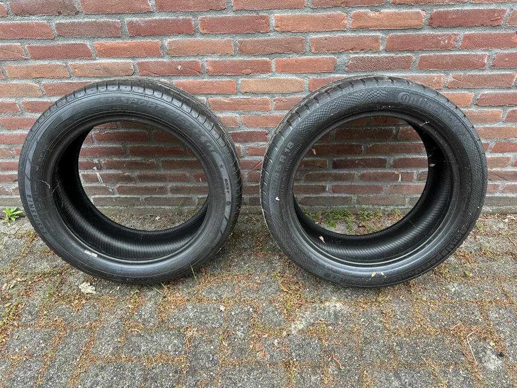 Dunlop en continental band, zo goed als nieuw, Ophalen, 18 inch, 245 mm, Nieuw