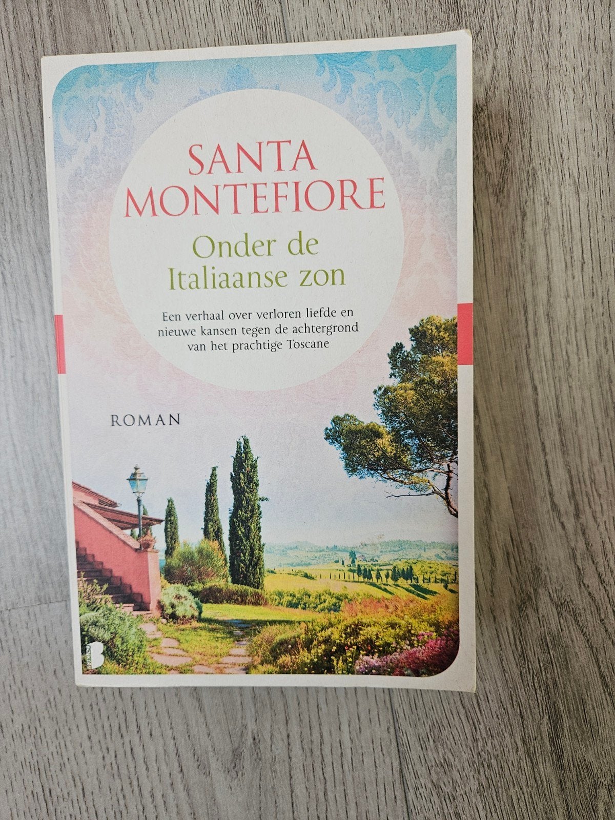 Santa Montefiore - Onder de Italiaanse zon, Boeken, Ophalen of Verzenden, Zo goed als nieuw, Santa Montefiore
