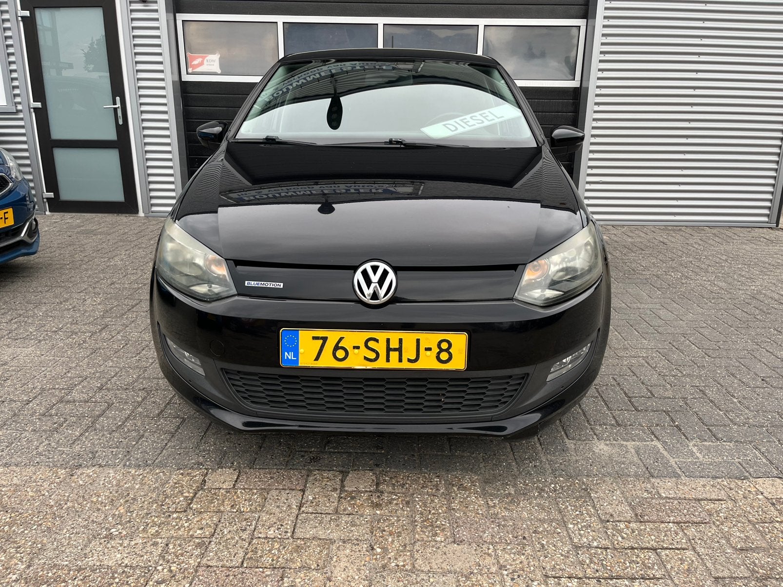 Volkswagen Polo 1.2 TDI 55KW BM 5DRS BJ 2011 Zwart, Auto's, Voorwielaandrijving, Euro 5, Stof, 74 pk