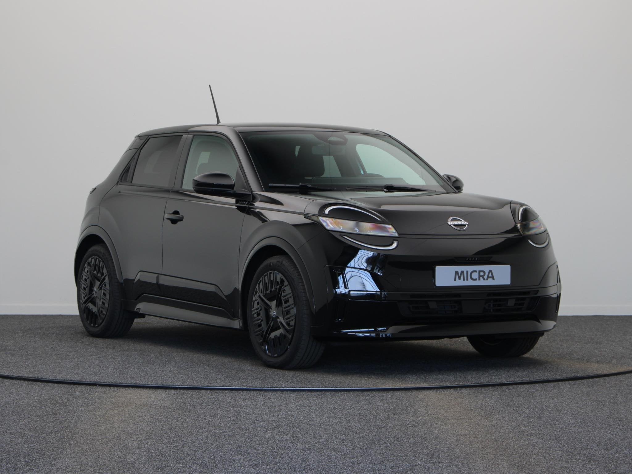 Nissan Micra AKARI 40 kWh 120pk | Midnight Pack | Uniek bij, Auto's, Dealer onderhouden, Stof, 317 km, Nieuw
