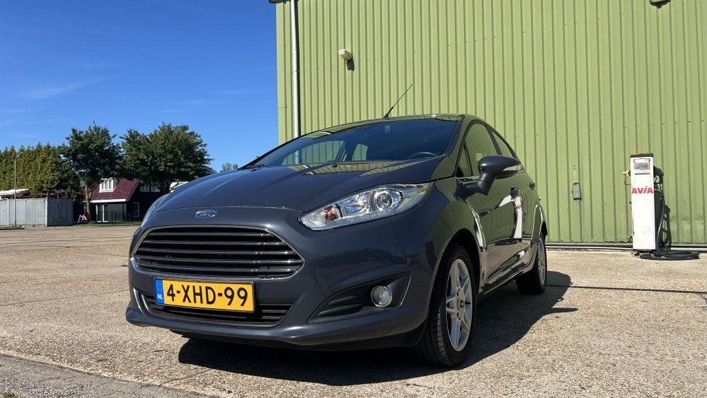 Ford Fiesta 1.0 EcoB. Titanium (bj 2014), Auto's, Ford, Euro 5, 101 pk, 40 €/maand, 23 km/l