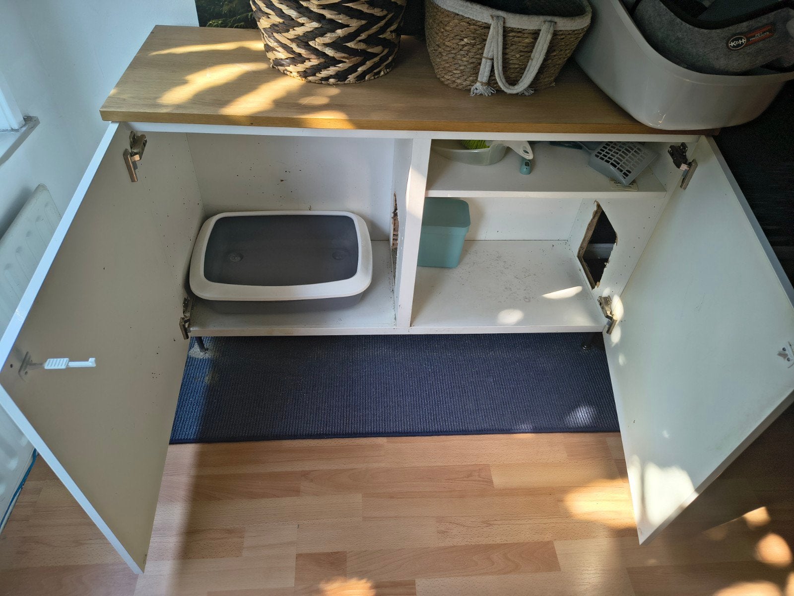 kattenbak kast, Ophalen