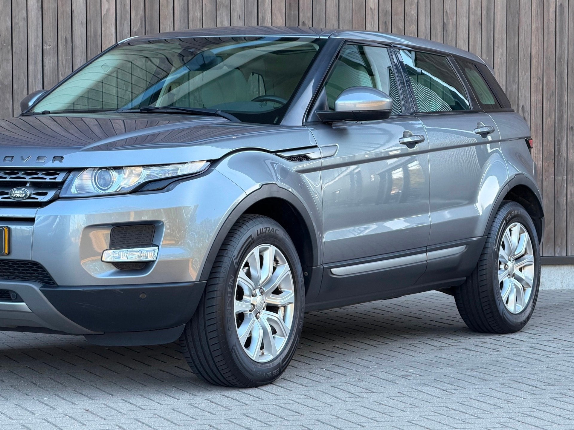 Land Rover Range Rover Evoque 2.0 Si 4WD Pure / Panoramadak, Auto's, Euro 5, 4 cilinders, Automatische klimaatregeling, Bedrijf