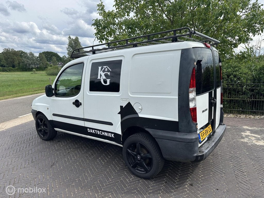 Fiat Doblo Cargo 1.2 Dynamic werkbus met imperiaal NAP✅, Auto's, Bestelauto's, 65 pk, Stof, Gebruikt, 1242 cc