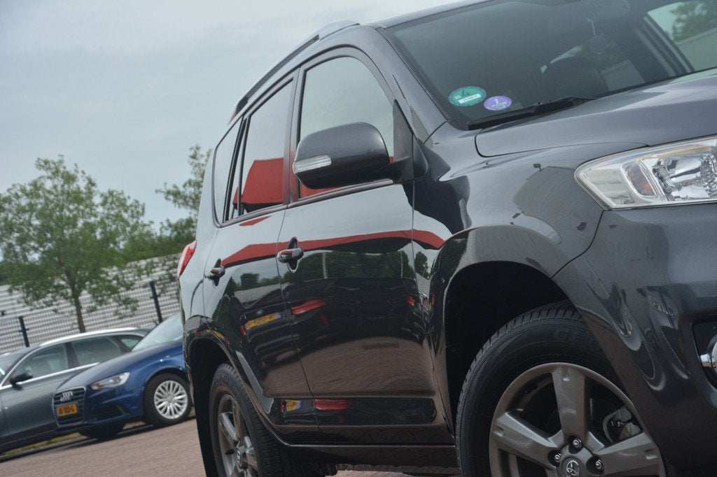 Toyota RAV4 2.0 VVTi Executive Business | Navigatie | Leer |, Auto's, Toyota, 13 km/l, Euro 5, Gebruikt, Zwart