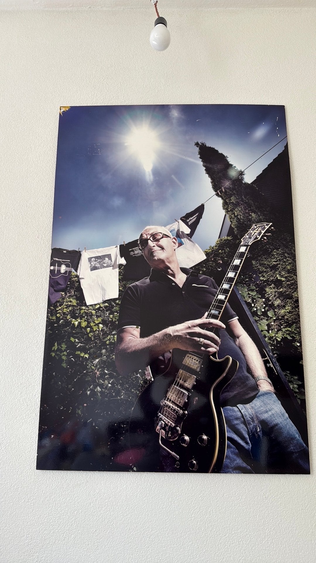 Foto portret Jan Akkerman gemaakt door Henk Veenstra, Ophalen