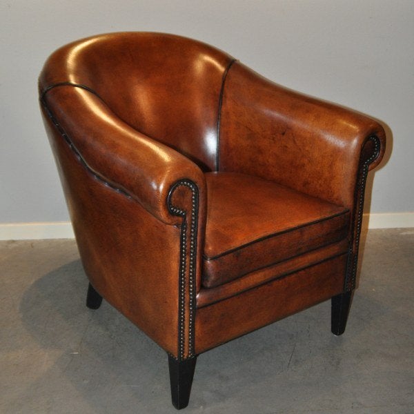 Schapenlederen clubfauteuil van Lounge Atelier, Ophalen of Verzenden, Zo goed als nieuw, Leer