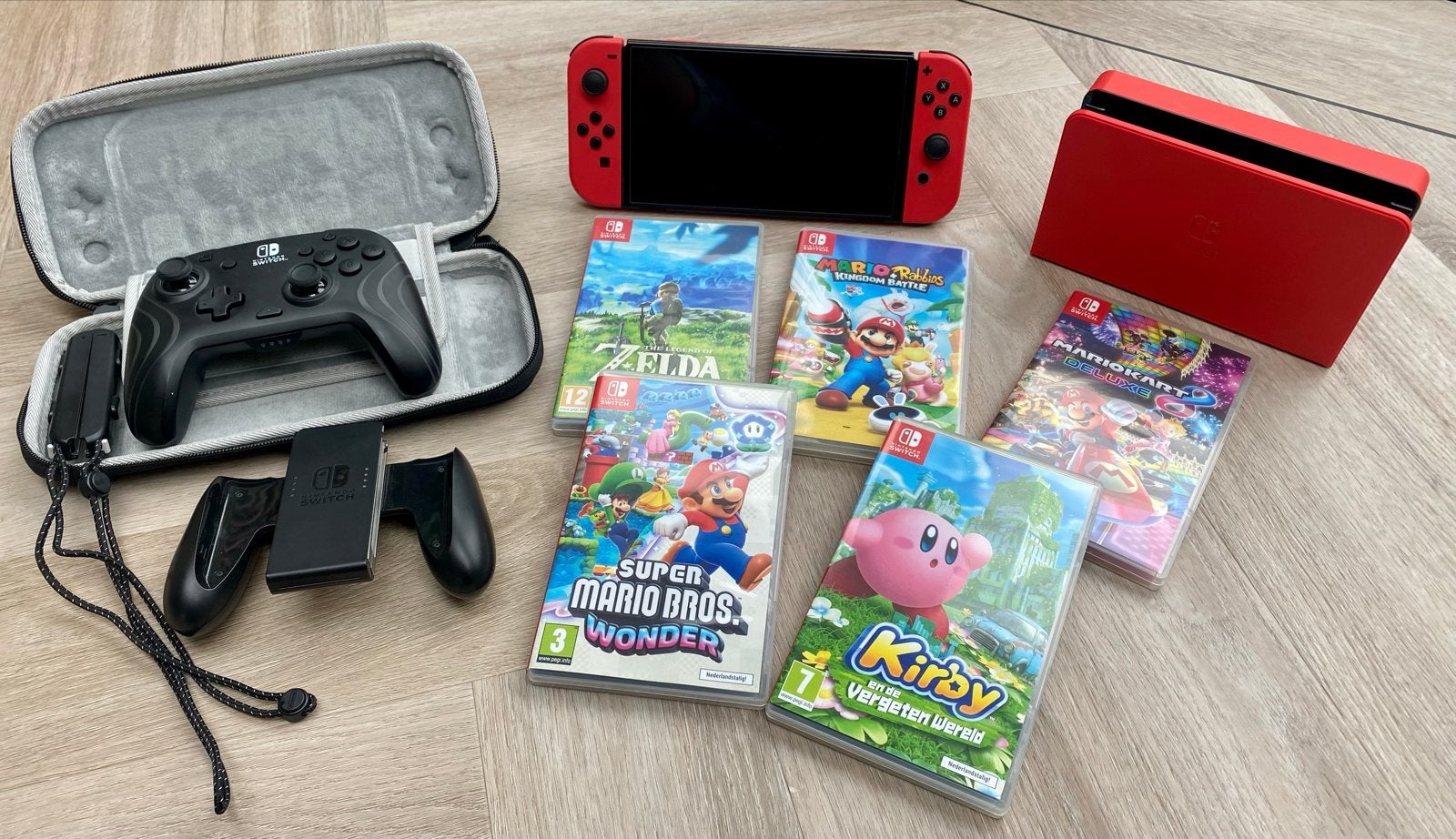 Nintendo Switch OLED + 5 games + extra controller, Switch OLED, Met games, Met 2 controllers, Ophalen of Verzenden