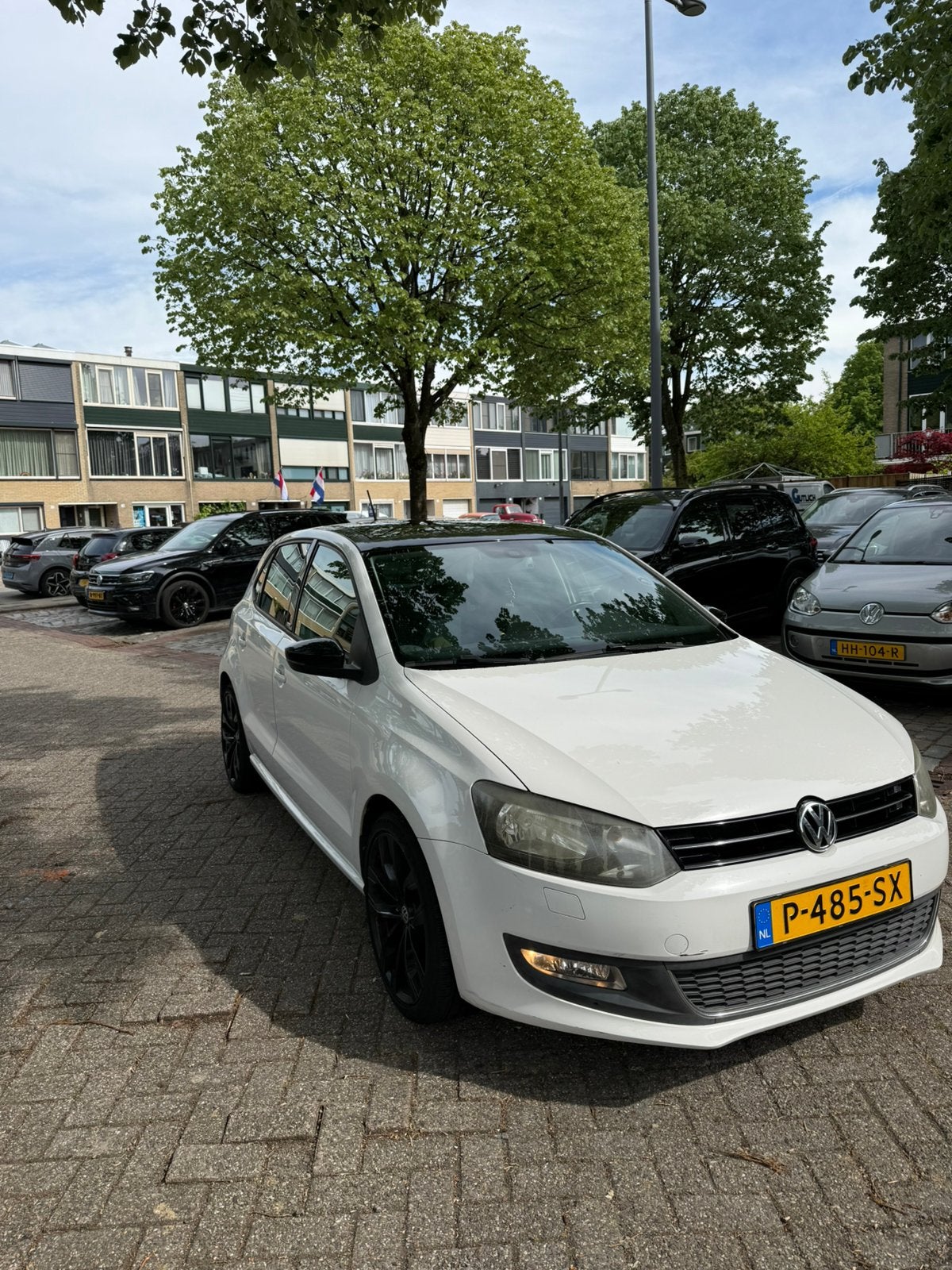 Volkswagen Polo 1.2 6V 44KW 5D 2011 Wit, Auto's, Volkswagen, Voorwielaandrijving, 40 €/maand, Zwart, 1198 cc
