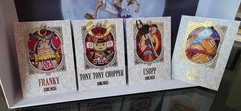 Panini One Piece - Set van 4 Goudfolie Power Cards, Hobby en Vrije tijd, Ophalen of Verzenden, Zo goed als nieuw, Meerdere kaarten